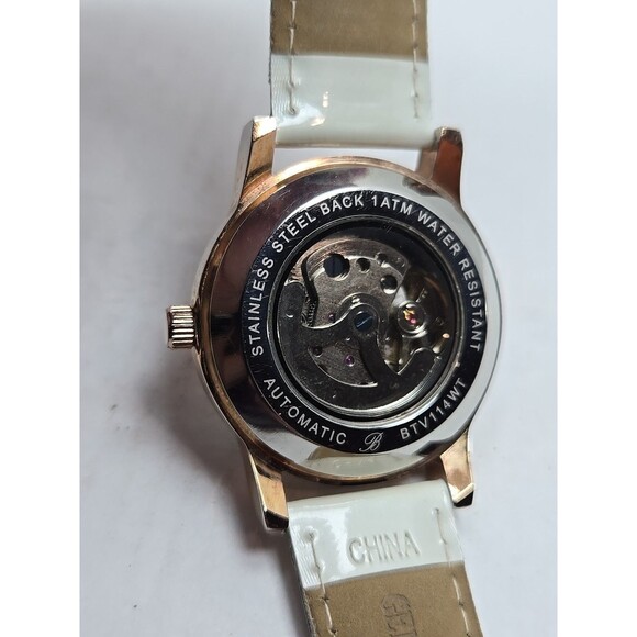 Burgi Automatic Skeleton Watch Rose Gold Crystal Bezel White Strap Exhibition - Picture 13 of 15